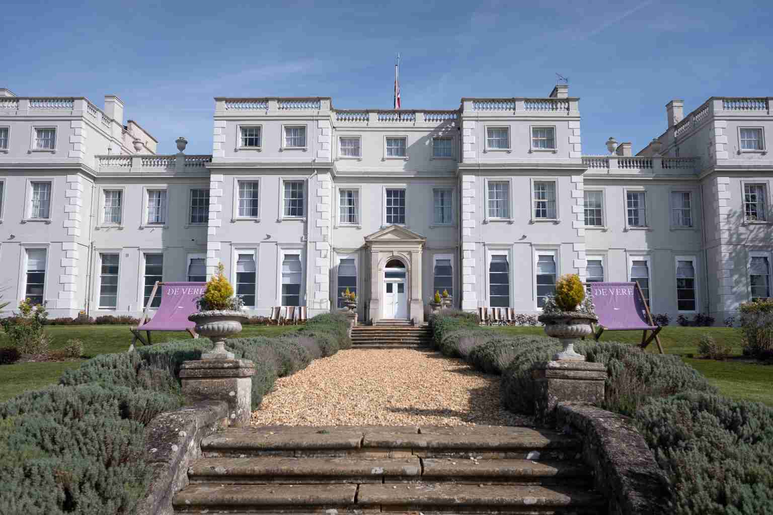 De vere Wokefield estate (Manor house) 1 Grand white manor house venue exterior with a garden pathway