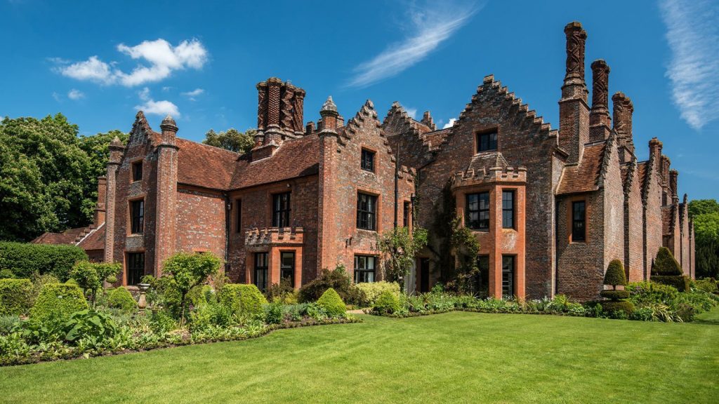 Chenies Manor wedding venue exterior with landscaped lawns