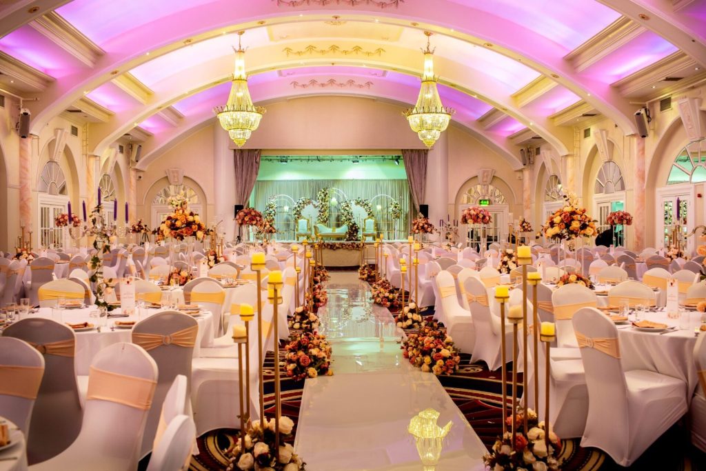 Wedding Decoration 4 Wedding decoration styling in a hall corridor lit with purple uplighting
