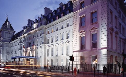Wedding venue building exterior illuminated in purple at night