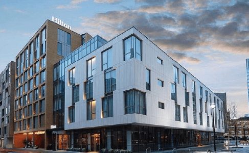 Modern glass-fronted wedding venue building exterior